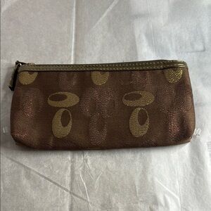 Brown and Gold Signatures Patterned Clutch